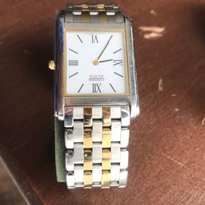 Citizen gold and silver plated eco drive watch